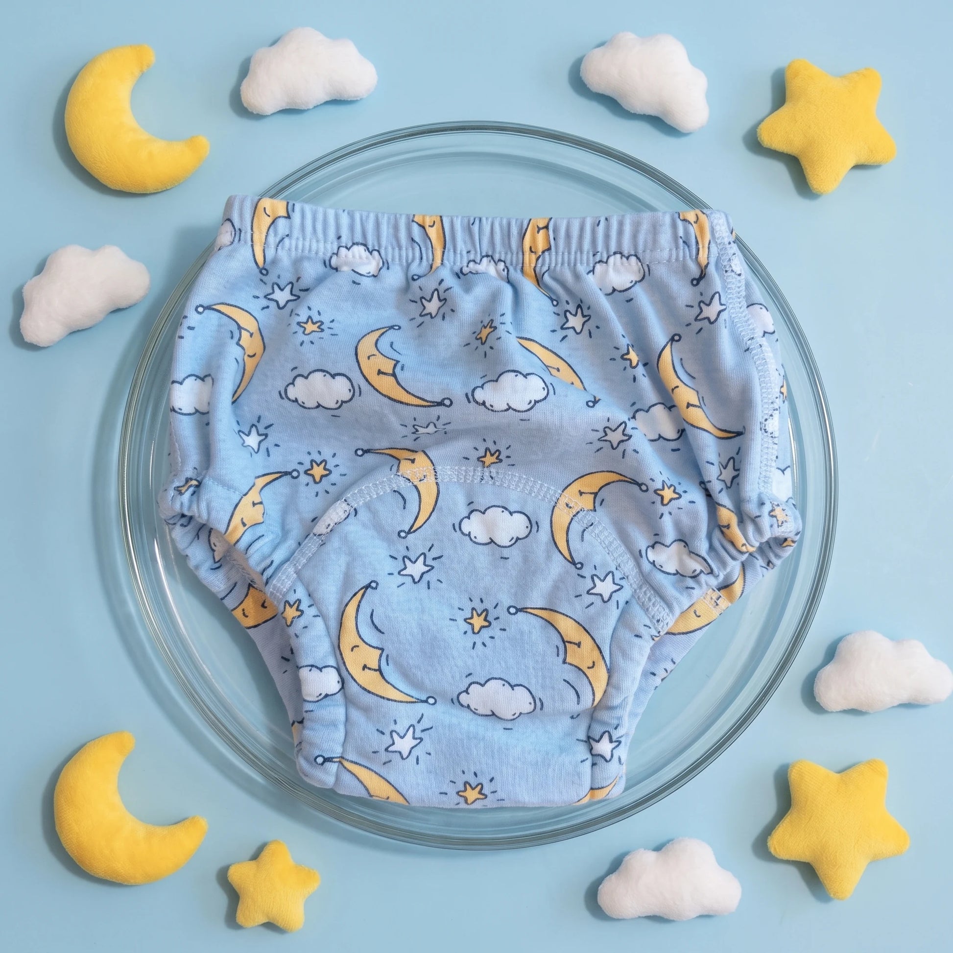 Braguita de aprendizaje Milhen azul claro con estampado de lunas y nubes
